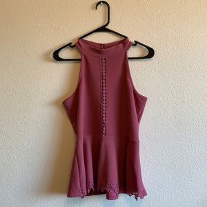 Cute blouse/ tank top, a nice light plum color.